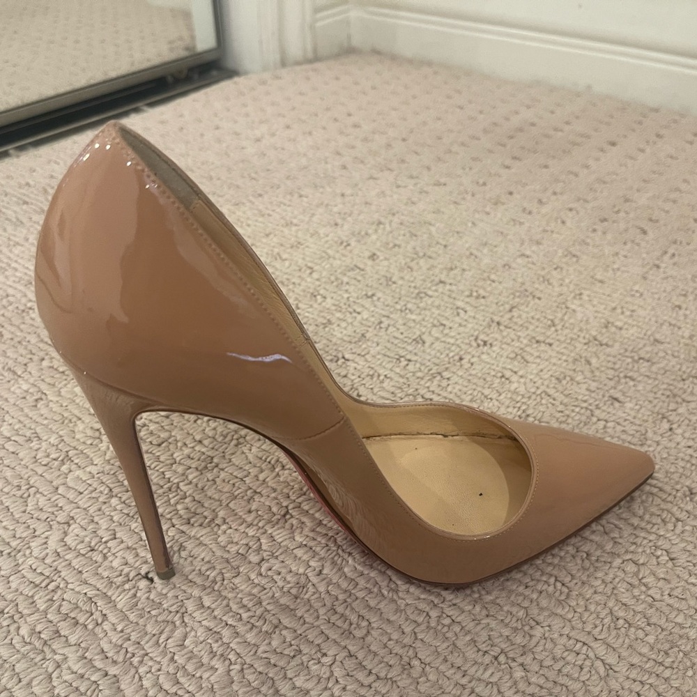Christian Louboutin beige heel size 38.5.  Worn but in good condition.